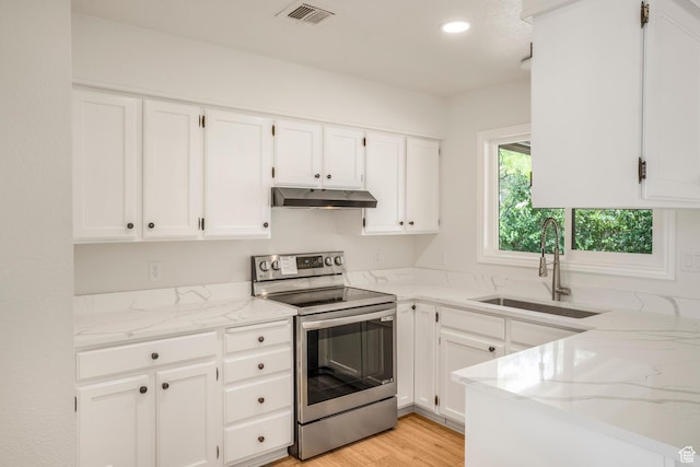1098 N 1900 W, St George, UT 84770 - kitchen featuring stainless steel electric range oven, a sink, under cabinet range hood, light stone countertops, and recessed lighting