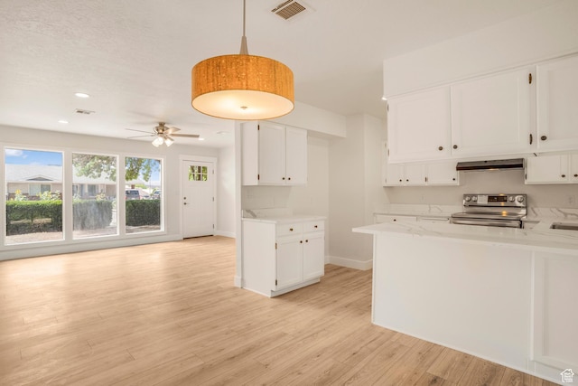 1098 N 1900 W, St George, UT 84770 - kitchen with stainless steel range with electric stovetop, range hood, light wood-style flooring, white cabinetry, and baseboards