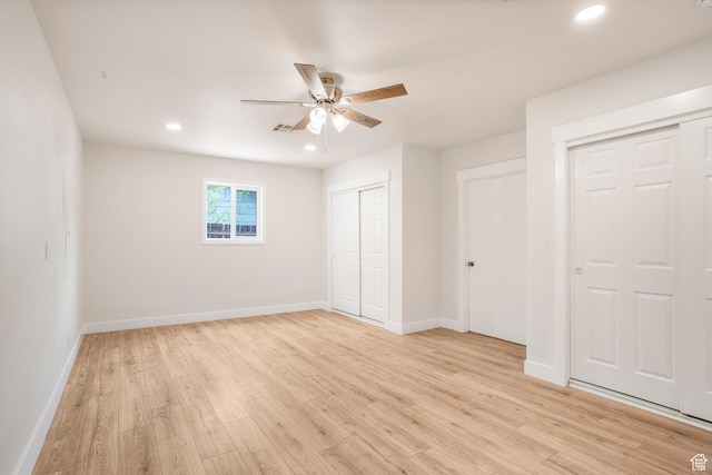 1098 N 1900 W, St George, UT 84770 - unfurnished bedroom featuring multiple closets, light wood finished floors, baseboards, recessed lighting, and ceiling fan