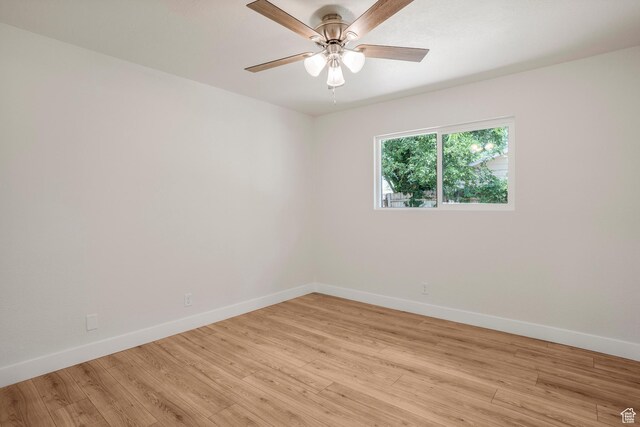 1098 N 1900 W, St George, UT 84770 - spare room featuring baseboards, light wood-style floors, and a ceiling fan