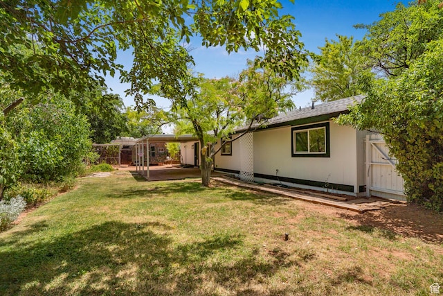 1098 N 1900 W, St George, UT 84770 - view of yard featuring a patio and a carport