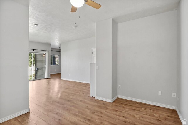 2108 W 2180 N, Lehi, UT 84043 - unfurnished room featuring ceiling fan, light wood-style flooring, and baseboards