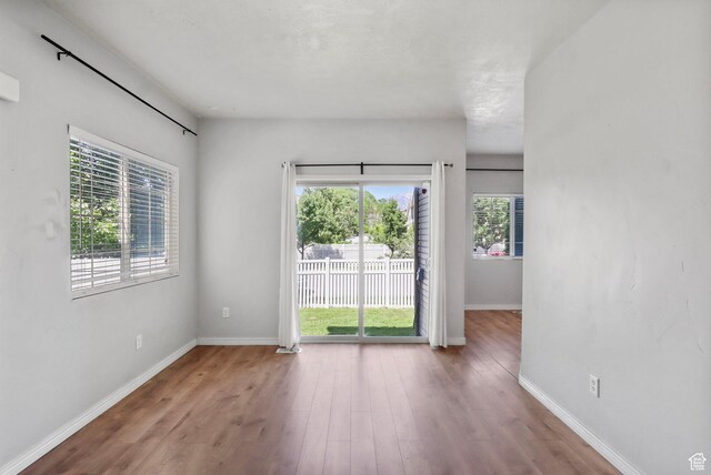 2108 W 2180 N, Lehi, UT 84043 - empty room featuring wood finished floors and baseboards
