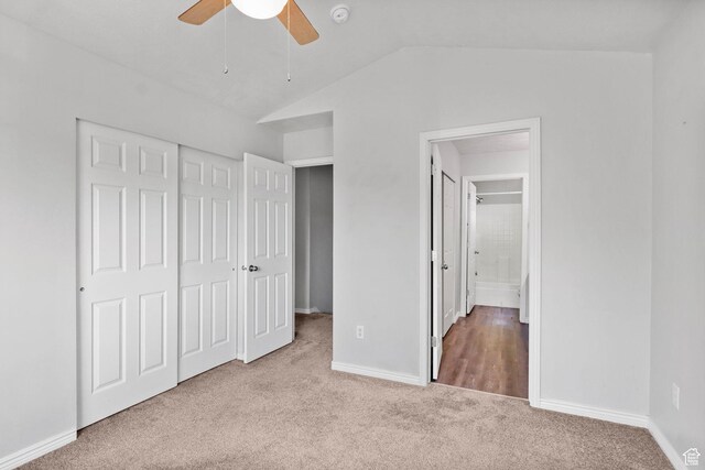 2108 W 2180 N, Lehi, UT 84043 - unfurnished bedroom with carpet flooring, vaulted ceiling, a closet, baseboards, and ceiling fan