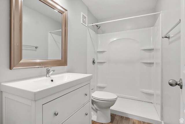 2108 W 2180 N, Lehi, UT 84043 - bathroom with wood finished floors, vanity, a shower, and toilet
