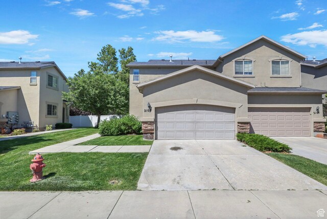 2108 W 2180 N, Lehi, UT 84043 - traditional-style home with stucco siding and concrete driveway