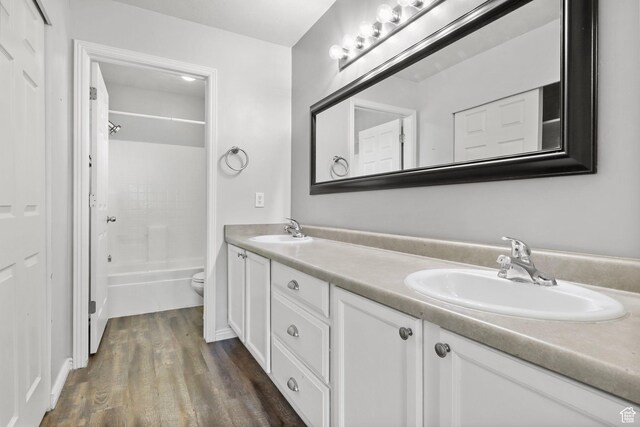 2108 W 2180 N, Lehi, UT 84043 - full bath featuring double vanity, toilet, wood finished floors, and  shower combination