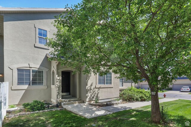 2108 W 2180 N, Lehi, UT 84043 - view of front facade featuring stucco siding and a front yard