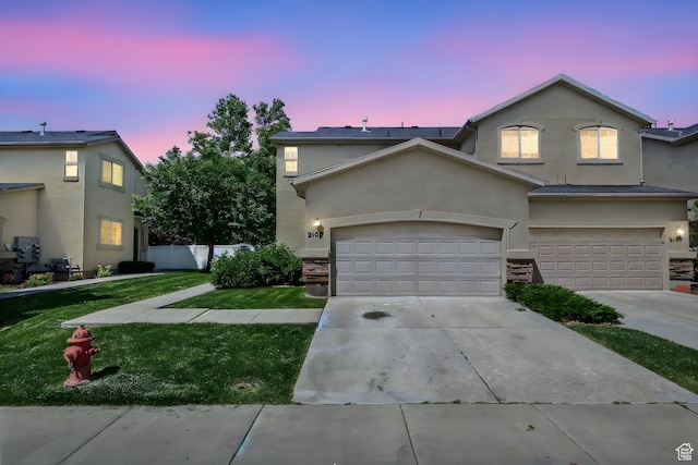 2108 W 2180 N, Lehi, UT 84043 - traditional-style house featuring stucco siding and concrete driveway