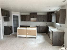 1923 W 1340 N, Clinton, UT 84015 - kitchen with dark brown cabinets