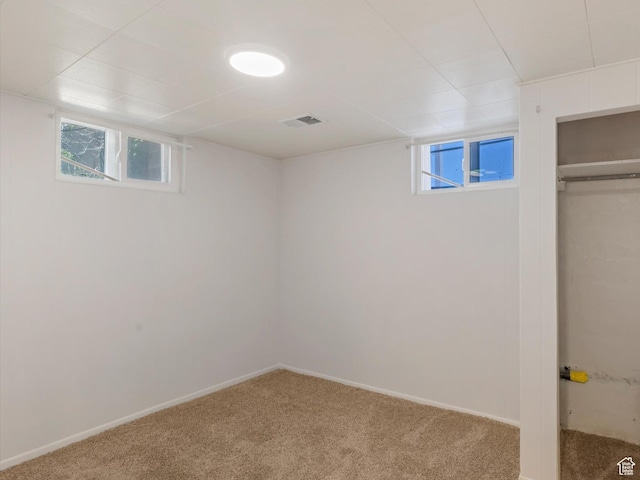 5147 S 2200 W, Salt Lake City, UT 84129 - below grade area featuring carpet, plenty of natural light, and baseboards