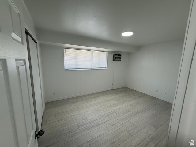 1071 N 150 W, Orem, UT 84057 - empty room with light wood-style flooring and an AC wall unit