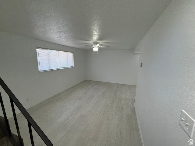 1071 N 150 W, Orem, UT 84057 - spare room featuring ceiling fan, light wood-type flooring, and a textured ceiling