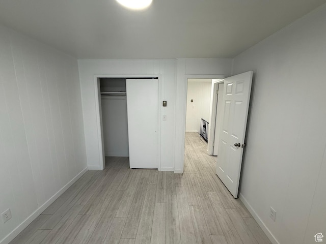 1071 N 150 W, Orem, UT 84057 - unfurnished bedroom featuring light wood finished floors and a closet