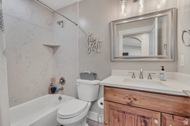 719 E Center St, Genola, UT 84655 - bathroom featuring vanity, shower / washtub combination, and toilet
