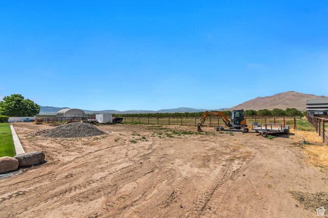 719 E Center St, Genola, UT 84655 - view of yard with a mountain view, a view of countryside, and a playground