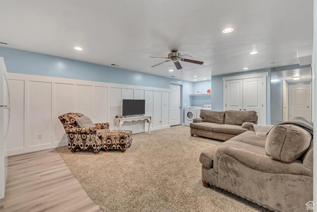 719 E Center St, Genola, UT 84655 - living room with a ceiling fan, washer and dryer, recessed lighting, a decorative wall, and light wood-style floors