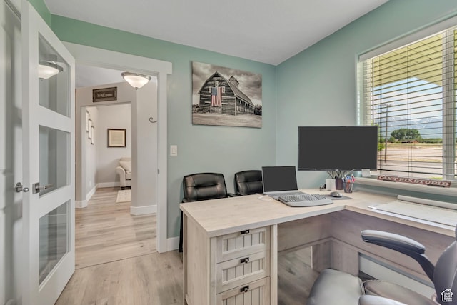 719 E Center St, Genola, UT 84655 - home office featuring baseboards and light wood-type flooring