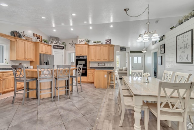719 E Center St, Genola, UT 84655 - dining area with recessed lighting, a chandelier, and light tile patterned floors