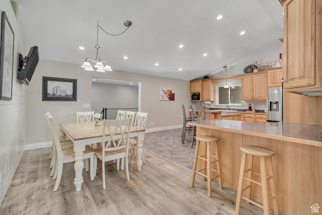 719 E Center St, Genola, UT 84655 - dining area with baseboards, recessed lighting, lofted ceiling, a chandelier, and light wood-style floors