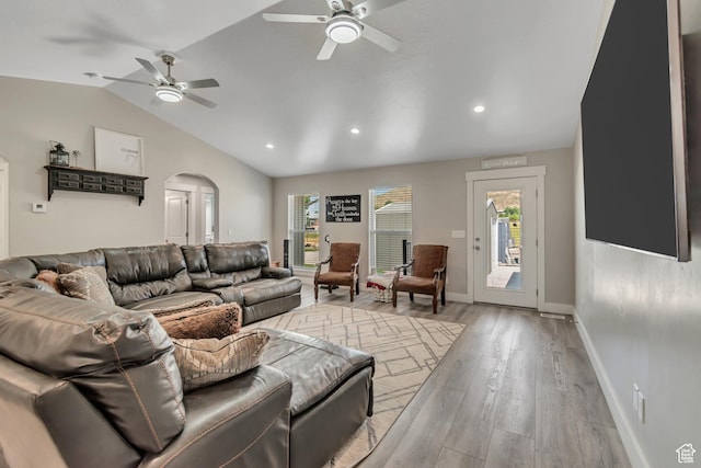 719 E Center St, Genola, UT 84655 - living room with a ceiling fan, wood finished floors, vaulted ceiling, arched walkways, and baseboards