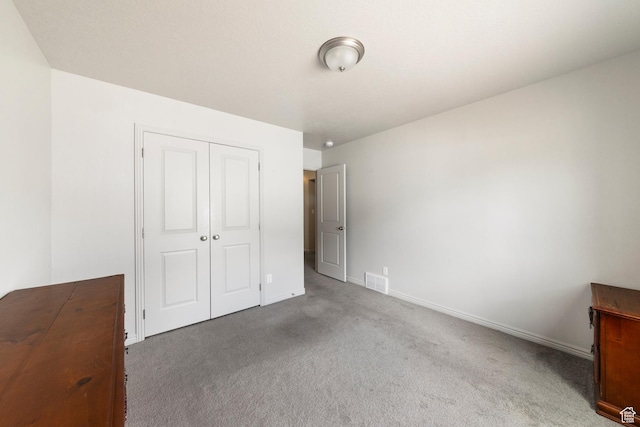 1788 S Longview Rd Unit 161, Santaquin, UT 84655 - unfurnished bedroom featuring carpet, a closet, and baseboards