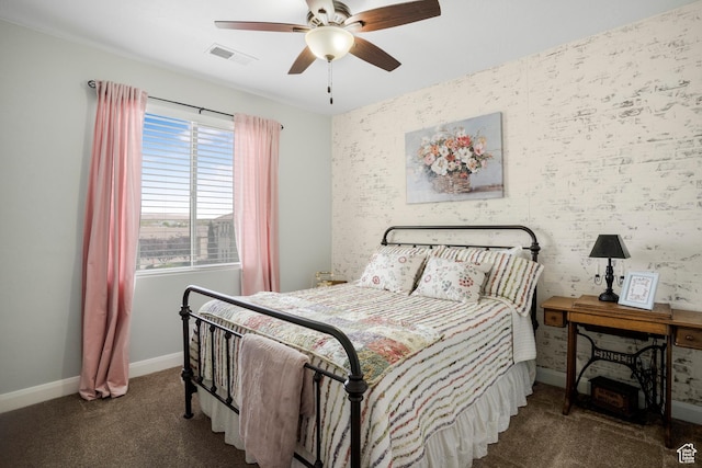 2699 S 2000 E, St George, UT 84790 - bedroom featuring carpet, baseboards, an accent wall, and ceiling fan
