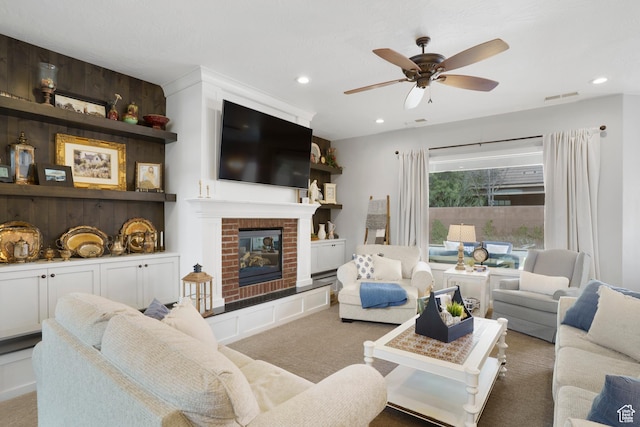 2699 S 2000 E, St George, UT 84790 - carpeted living area featuring ceiling fan, recessed lighting, and a brick fireplace
