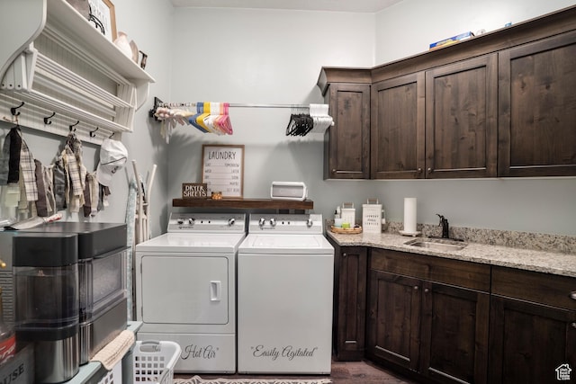 2699 S 2000 E, St George, UT 84790 - washroom featuring separate washer and dryer, cabinet space, and wood finished floors