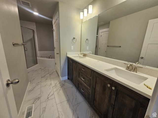 1192 W 1130 S Unit 202, Payson, UT 84651 - full bath featuring marble finish flooring, baseboards, a garden tub, double vanity, and a stall shower