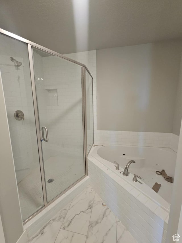 1192 W 1130 S Unit 202, Payson, UT 84651 - full bathroom with a garden tub, a stall shower, and marble look tiles