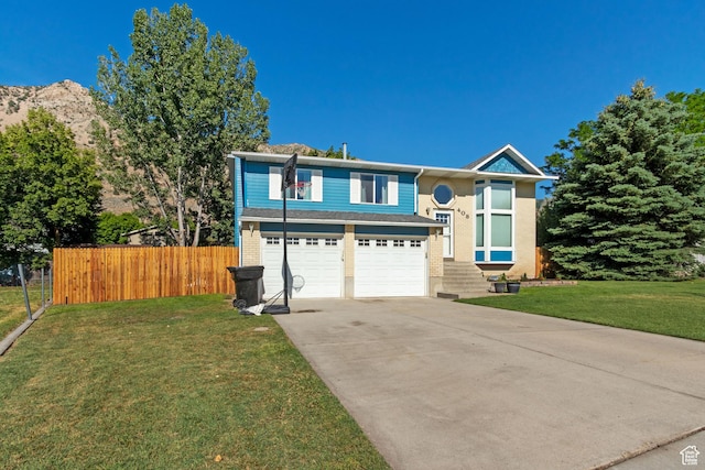 408 E 850 N, Brigham City, UT 84302 - view of front facade featuring concrete driveway and an attached garage