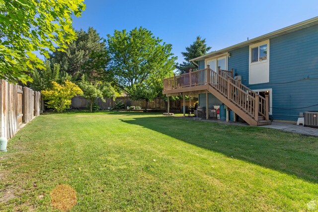 408 E 850 N, Brigham City, UT 84302 - view of yard featuring stairs, a deck, and central AC