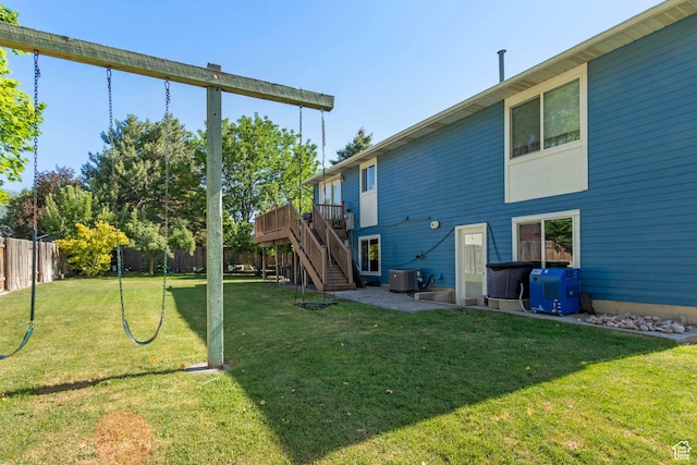 408 E 850 N, Brigham City, UT 84302 - rear view of house with stairway, a wooden deck, central AC unit, and a patio area