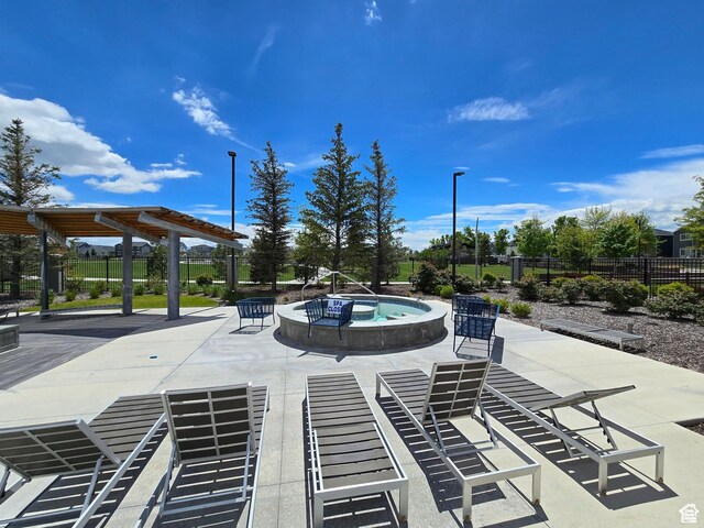 633 N Sun Peak Dr, Vineyard, UT 84059 - view of swimming pool with an in-ground hot tub and a patio area