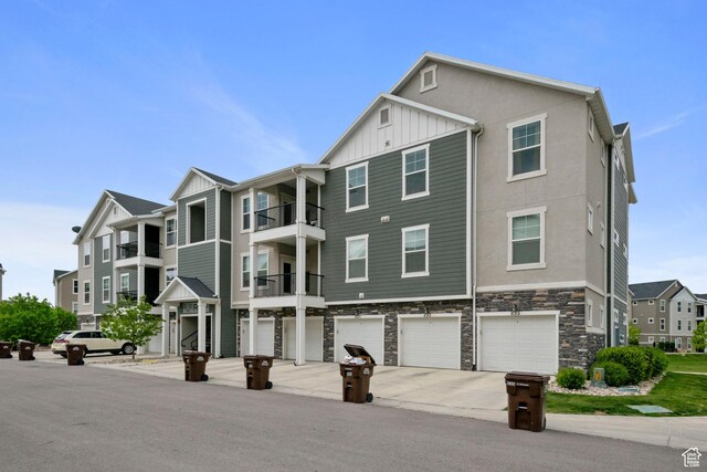 633 N Sun Peak Dr, Vineyard, UT 84059 - view of building exterior featuring an attached garage and driveway