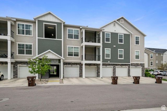 633 N Sun Peak Dr, Vineyard, UT 84059 - multi unit property featuring board and batten siding, stone siding, and a garage
