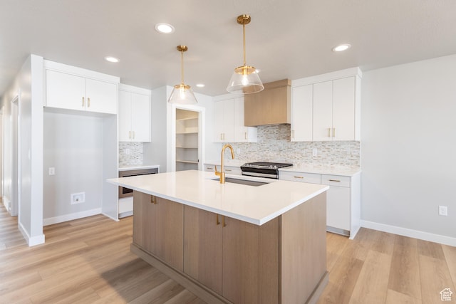3087 N 2875 W Unit 4, Plain City, UT 84404 - kitchen featuring tasteful backsplash, light wood finished floors, recessed lighting, white cabinets, and light countertops