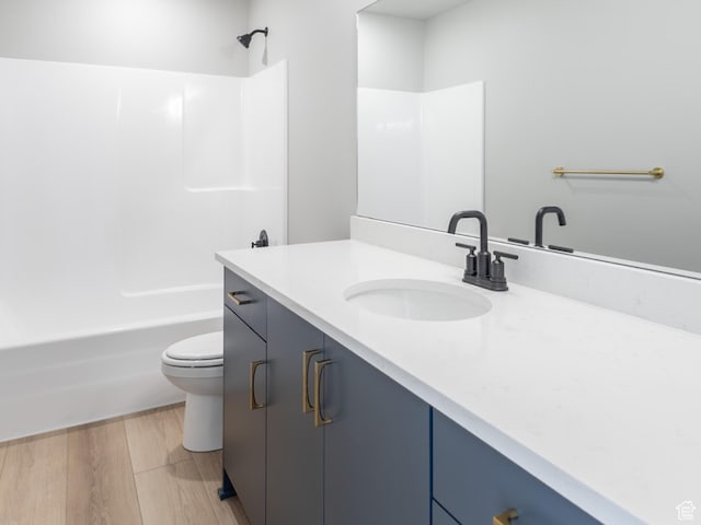3087 N 2875 W Unit 4, Plain City, UT 84404 - full bath featuring vanity, shower / bath combination, and wood finished floors