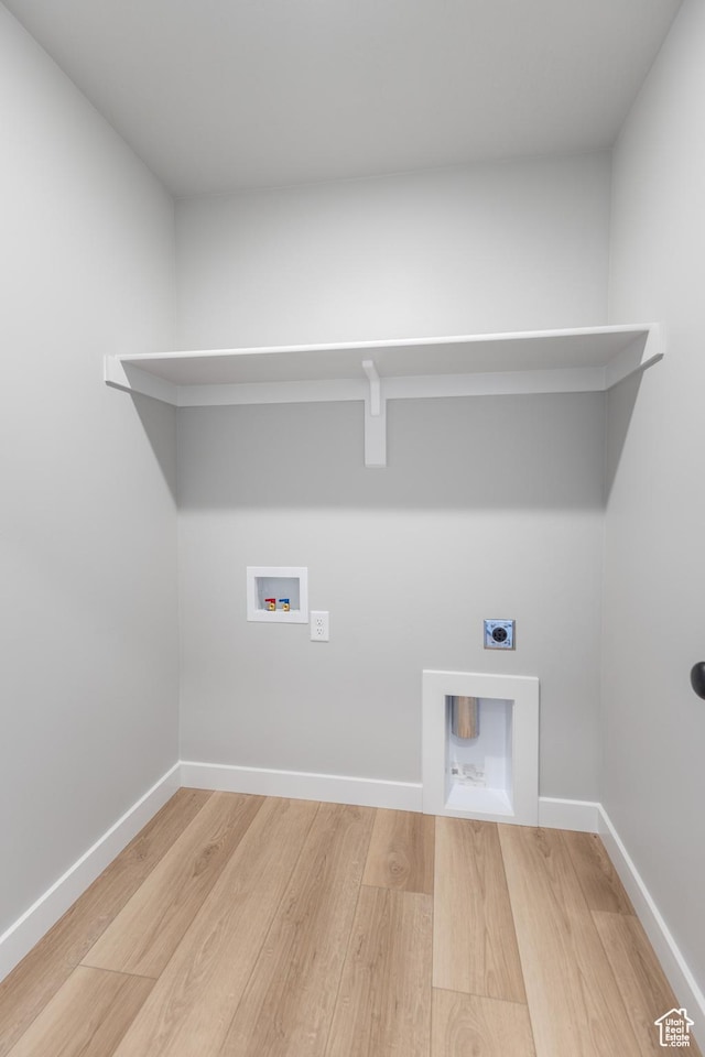 3087 N 2875 W Unit 4, Plain City, UT 84404 - laundry area with electric dryer hookup, light wood-type flooring, and washer hookup
