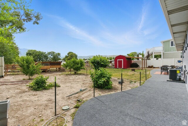 12345 S Redwood Rd, Riverton, UT 84065 - fenced backyard featuring cooling unit and a patio