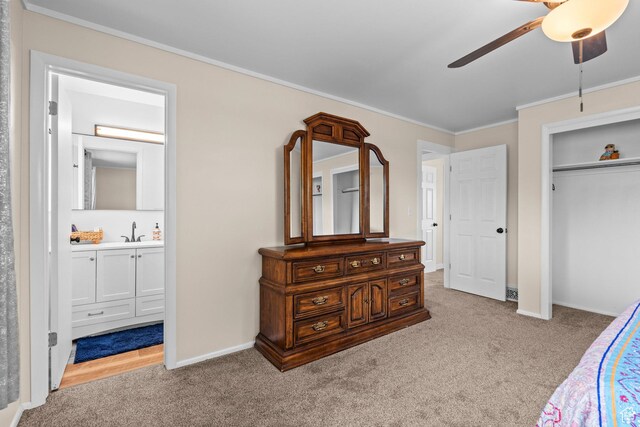 12345 S Redwood Rd, Riverton, UT 84065 - bedroom featuring carpet flooring, ornamental molding, connected bathroom, baseboards, and a closet