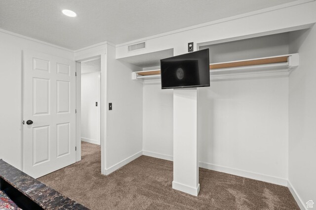 12345 S Redwood Rd, Riverton, UT 84065 - unfurnished bedroom featuring carpet, baseboards, and a textured ceiling