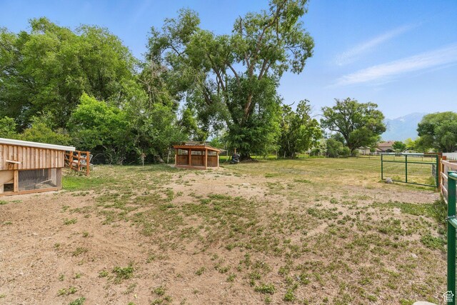 12345 S Redwood Rd, Riverton, UT 84065 - view of yard with exterior structure and an outdoor structure