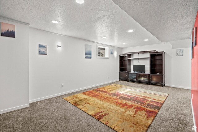 12345 S Redwood Rd, Riverton, UT 84065 - unfurnished living room with carpet, a textured ceiling, recessed lighting, and baseboards