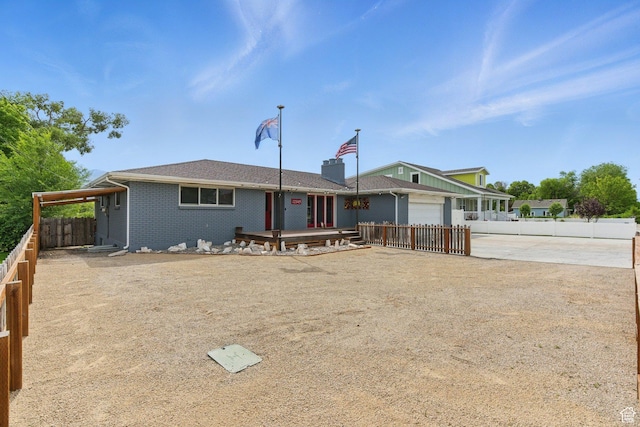 12345 S Redwood Rd, Riverton, UT 84065 - view of front of property with driveway, a garage, and brick siding