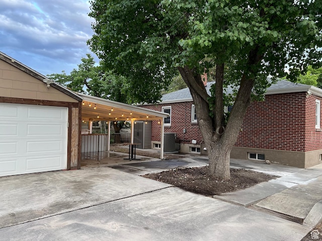 6 W Miller St S, Salt Lake City, UT 84107 - view of front of home with concrete driveway and a carport