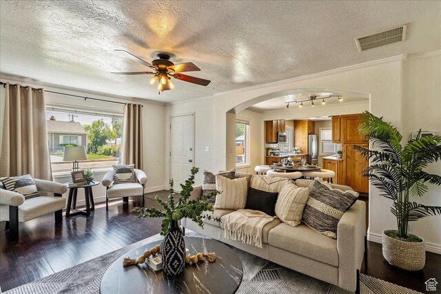 6 W Miller St S, Salt Lake City, UT 84107 - living area featuring arched walkways, wood finished floors, ornamental molding, a textured ceiling, and ceiling fan