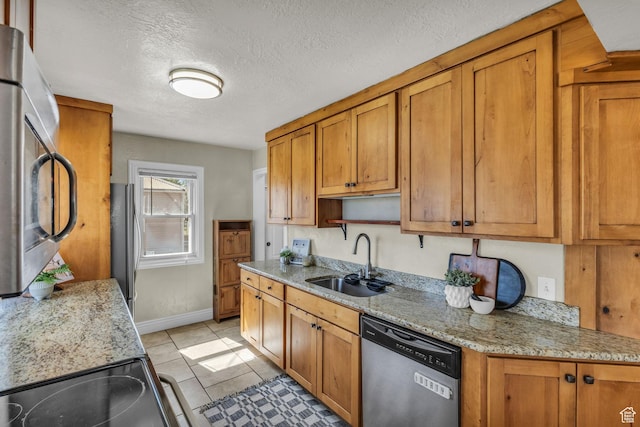 6 W Miller St S, Salt Lake City, UT 84107 - kitchen with appliances with stainless steel finishes, brown cabinets, light tile patterned flooring, open shelves, and a textured ceiling