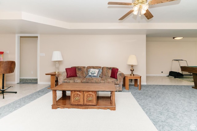 831 S 1150 E, Preston, ID 83263 - living room featuring carpet floors, a ceiling fan, and baseboards